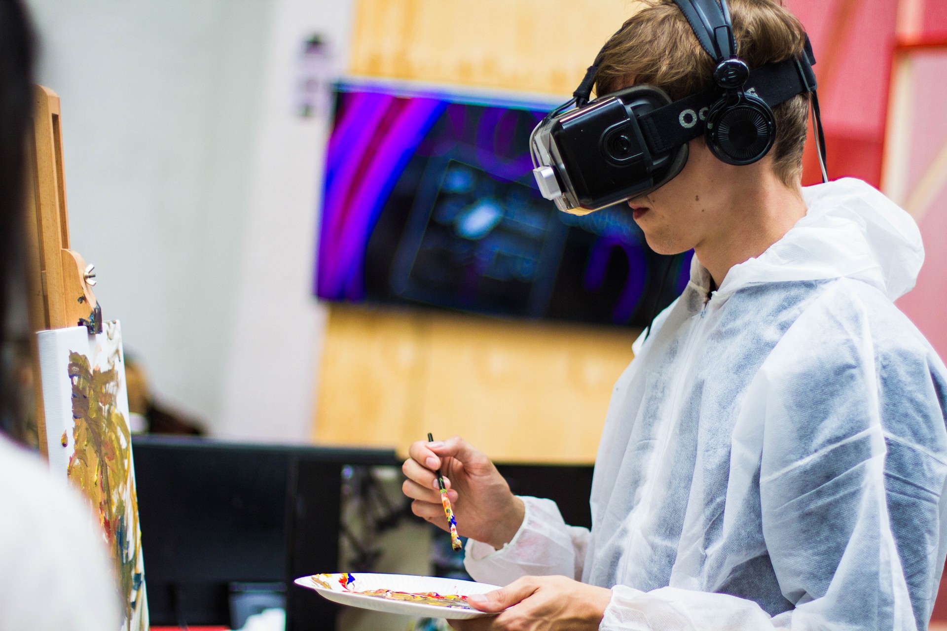 guy painting with vrgoggles